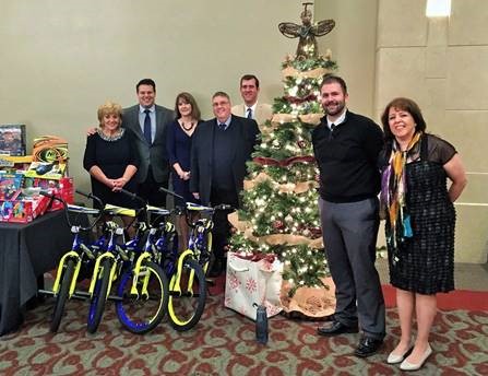 Paul Avery with the bikes Trans-Overseas donated to the Detroit Intermodal Association at their annual Charity event. Paul is in the center with Marcus Carbajo behind him to his right, Brett Ouellette and Linda Thompson on the far right. To his left is Andrea Blasengym, Andrew Bouchard and Susan Dysarczyk.